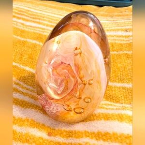 Pale pink and gold glass swirl paperweight